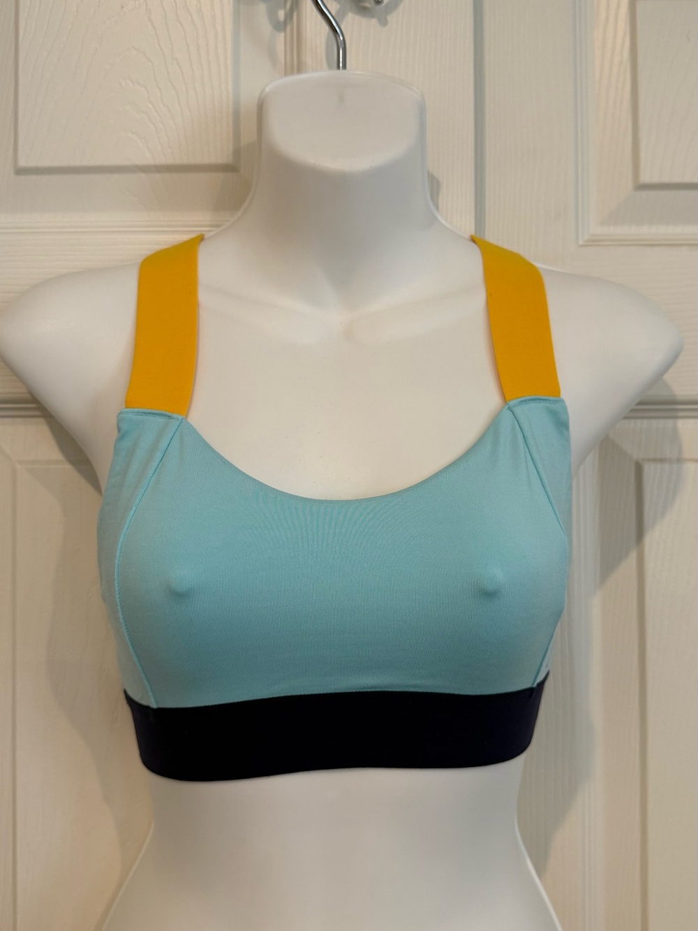Brooks Light Blue Sports Bra with Yellow Straps and Navy Blue Band